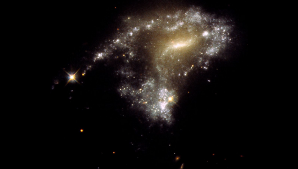 A SERIES OF STARS: GALAXY AM 1054-325