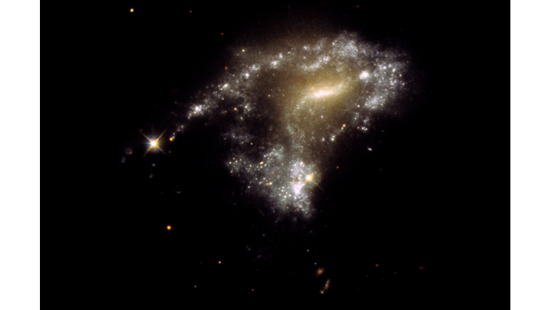 A SERIES OF STARS: GALAXY AM 1054-325