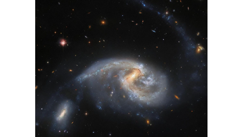 TWO GALAXIES IN COSMIC DANCE